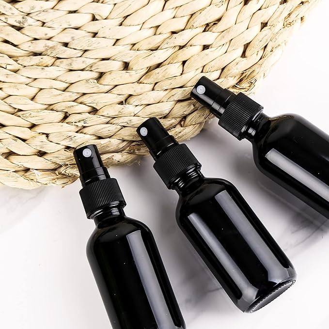 2oz UV Resistant Glass Spray Bottle, Fine Mist Boston Glass Bottles with Black Fine Mist Sprayer Small Clear Bottles for Essential Oils, Bath, Beauty, Hair & Cleaning, Black, Pack of 48