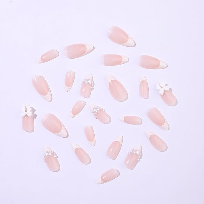 24Pcs White French Tip Press on Nails Medium Almond Fake Nails with Glitter Heart Nail Charms Acrylic Nails Cute Pearls Bow Full Cover False Nails Nude Pink Glue on Nails for Women DIY Stick on Nails