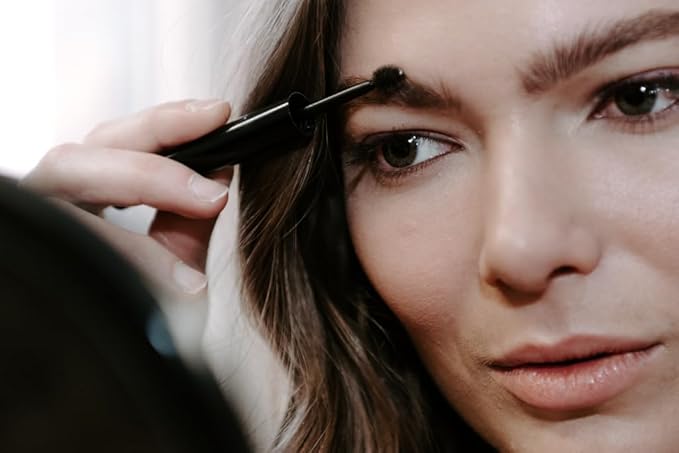 elke BROW FIXX (Brunette) fiber-rich ingredients adds natural thickness unique roller ball applicator long-lasting wear water resistant non-flaking (Brunette)