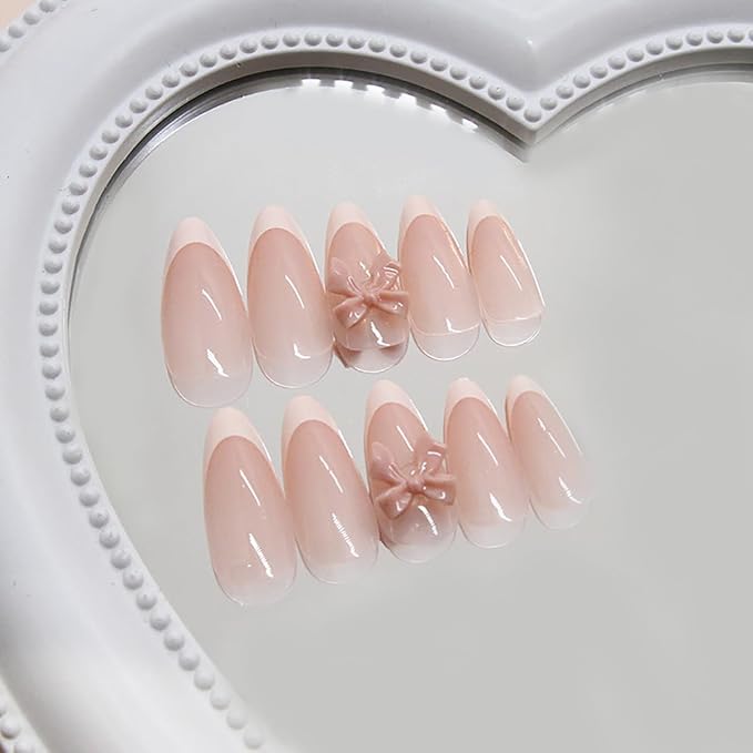 24Pcs Pink French Tip Press on Nails Medium Almond Shaped Fake Nails Cute Bow Charm Design Glue on Nails Reusable Acrylic False Nails Nude Pink Stick on Nails for Women Girls French Stiletto Manicure