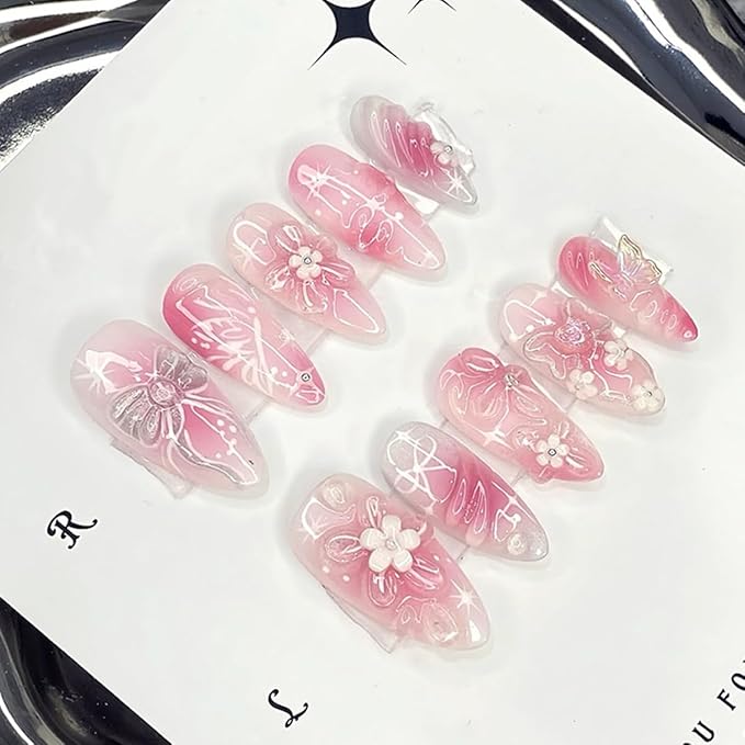 24Pcs Almond Press on Nails Handmade Pink Fake Nails 3D Flower False Nail Cute Bow Acrylic Nails Floral Butterfly Charms Rhinestones Medium Full Cover Glue on Nails Embossed Flower Nails for Women