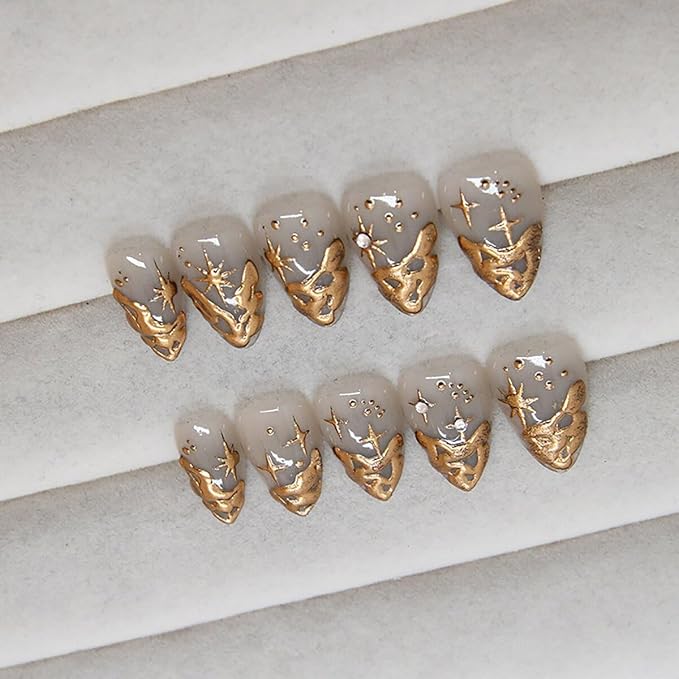 24Pcs Gold French Tip Press on Nails Short Almond Fake Nails 3D Gold Irregularity Chrome Acrylic Nails Star Moon False Nails French Nails Tip Glue on Nails Nude Stick on Artificial Nails for Women