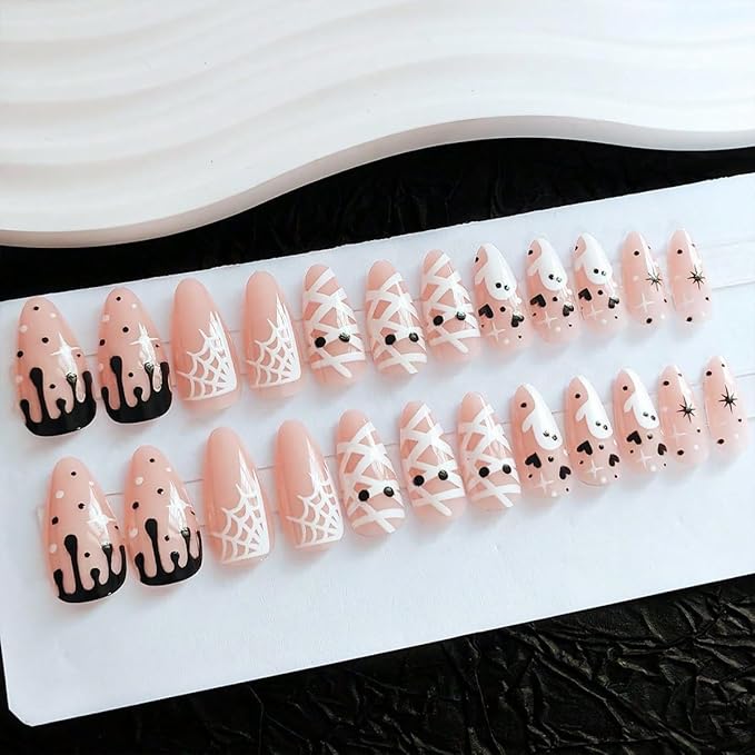 24Pcs Halloween Press on Nails Medium Almond Fake Nails with White Spider Web Mummy Heart Design Cute Ghost False Nails Nude Full Cover Artificial Glue on Nails Black Blood Stick on Nail for Women