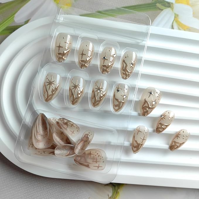24Pcs Gold French Tip Press on Nails Short Almond Fake Nails 3D Gold Irregularity Chrome Acrylic Nails Star Moon False Nails French Nails Tip Glue on Nails Nude Stick on Artificial Nails for Women