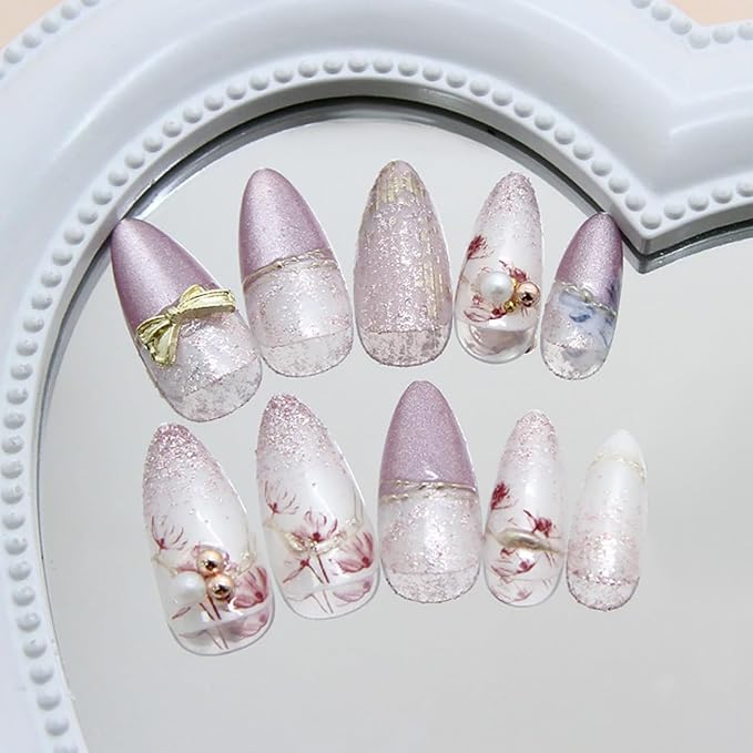 24Pcs Purple Flower Press on Nails Medium Almond Fake Nails with Pearl White Fine Sand Design Gold Bow Rhinestones False Nails Full Cover Artificial Glue on Nails Spring Stick on Nails for Women DIY