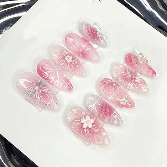 24Pcs Almond Press on Nails Handmade Pink Fake Nails 3D Flower False Nail Cute Bow Acrylic Nails Floral Butterfly Charms Rhinestones Medium Full Cover Glue on Nails Embossed Flower Nails for Women