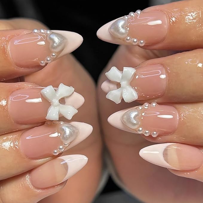 24Pcs White French Tip Press on Nails Medium Almond Fake Nails with Glitter Heart Nail Charms Acrylic Nails Cute Pearls Bow Full Cover False Nails Nude Pink Glue on Nails for Women DIY Stick on Nails