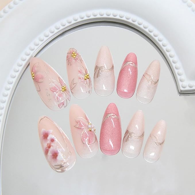 24Pcs Pink Flower Press on Nails Medium Almond French Fake Nails with Irregular Line Bow Design Cherry Blossom False Nails Full Cover Artificial Nails Cute Stick on Nail Pearl Nail Spring for Women