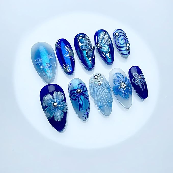 24Pcs Medium Almond Press on Nails French Tip Fake Nails Blue Full Cover False Nail with 3D Flowers Butterfly Designs Summer Glue on Nail Silver Star Acrylic Nail Cute Bow Stick on Nails for Women