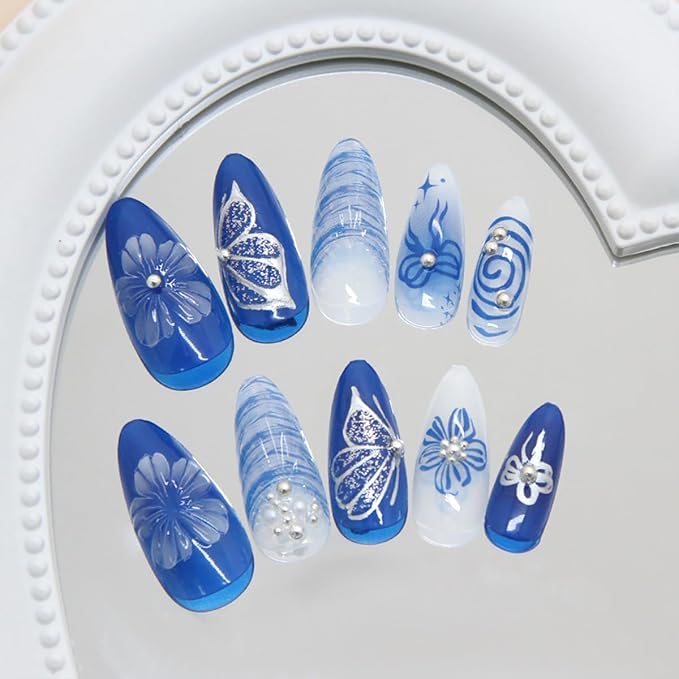 24Pcs Dark Blue Press on Nails Medium Almond Fake Nails Silvering Butterfly False Nails with Glitter 3D Gems Pearl Design Flower Star Bow Stick on Nail Full Cover Artificial Glue on Nails for Women