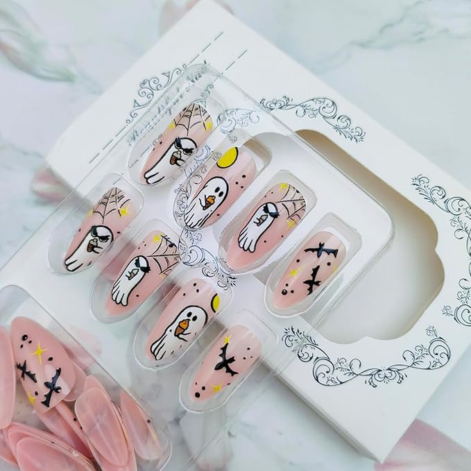 24Pcs Halloween Ghost Press on Nails Medium Almond Fake Nails with Stars Bat Spider Web Designs Glue on Nail Glossy Nude Acrylic Nail Halloween Full Cover Stick on Nails for Women DIY Manicure Salon