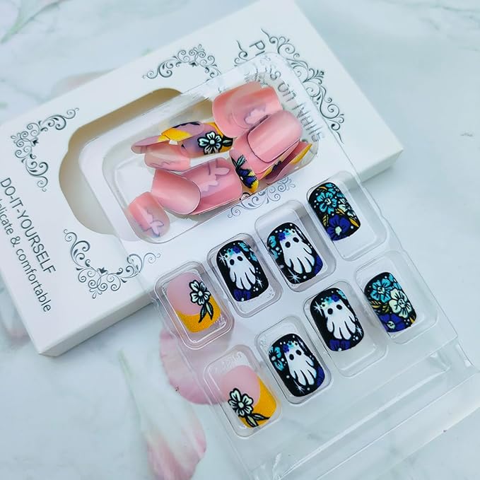 24Pcs Halloween Orange French Tip Press on Nails Short Square False Nail with Colorful Skull Flower Designs Halloween Fake Nails Cute Ghost Stick on Nail for Women DIY Manicure Decorations
