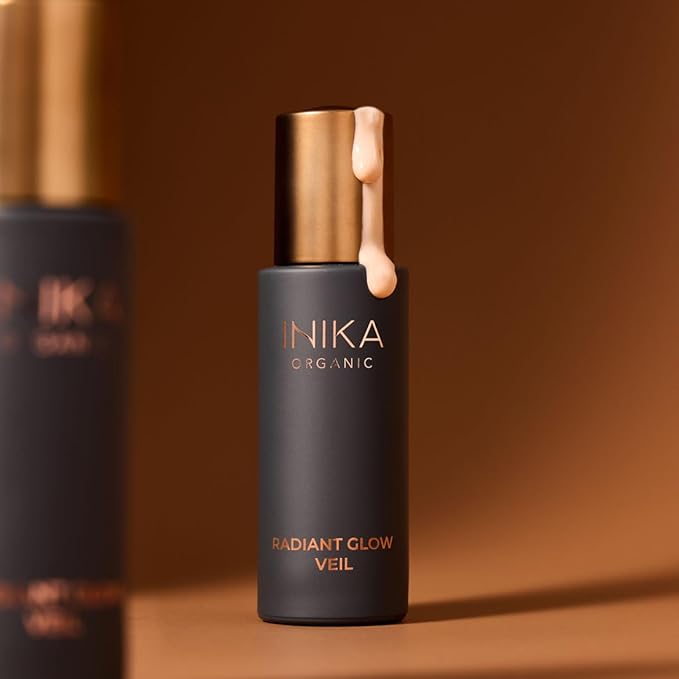 INIKA Organic Radiant Glow | Illuminate & Prime. Dewy, radiant Finish. Beautifying Primer, Nourishing Moisturiser, Finishing Highlighter. 100% Natural, 72% Organic Ingredients. Alcohol Free. 30mL