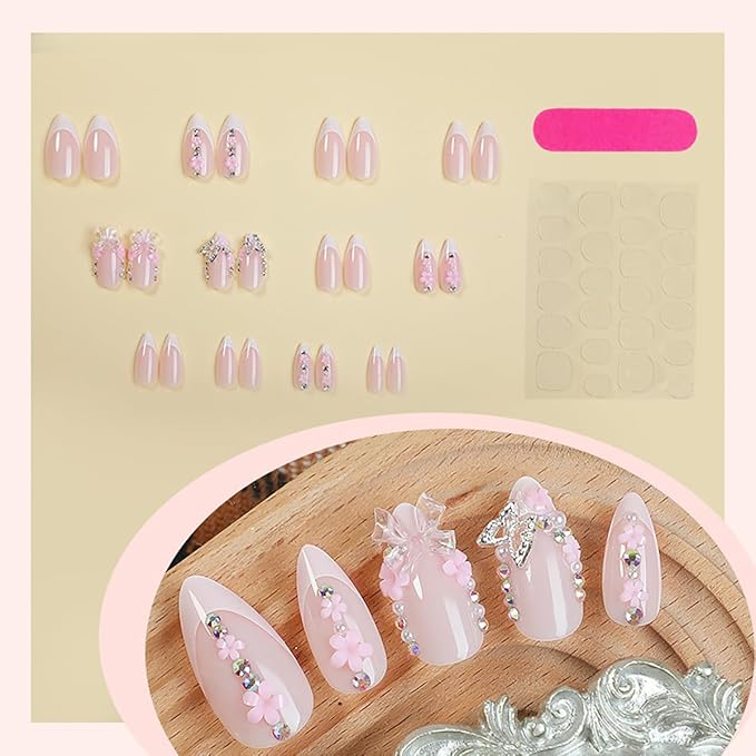 24Pcs Medium Almond Press on Nails Pink French Tip Fake Nails with 3D Flower Pearl Rhinestones Design Glossy Nude Glue on Nails Gold Butterfly Charm Artificial Nails Cute Bow Stick on Nails for Women