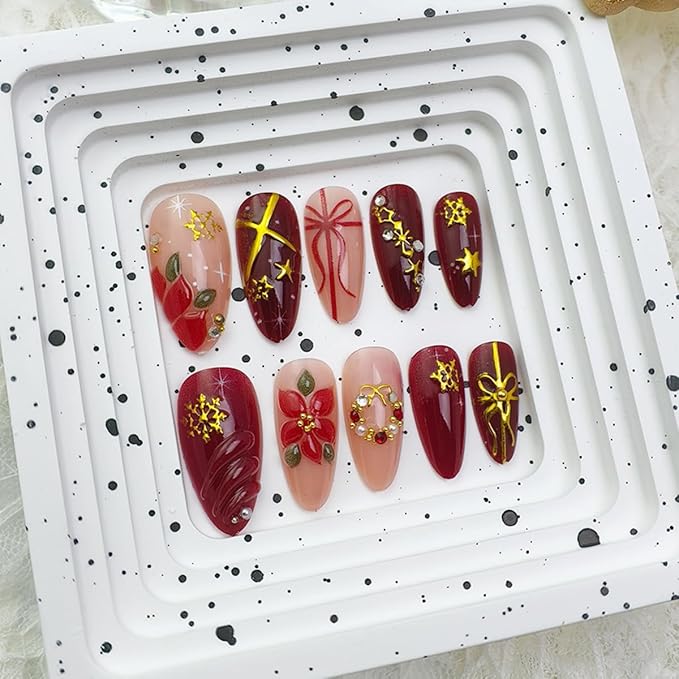 24Pcs Christmas Press on Nails Almond Handmade Fake Nails Snowflake Red Xmas Flower False Nails with 3D Gilding Bow Poinsettia Pearl Wreath Charms Medium Glue on Nails for Women New Year Manicure