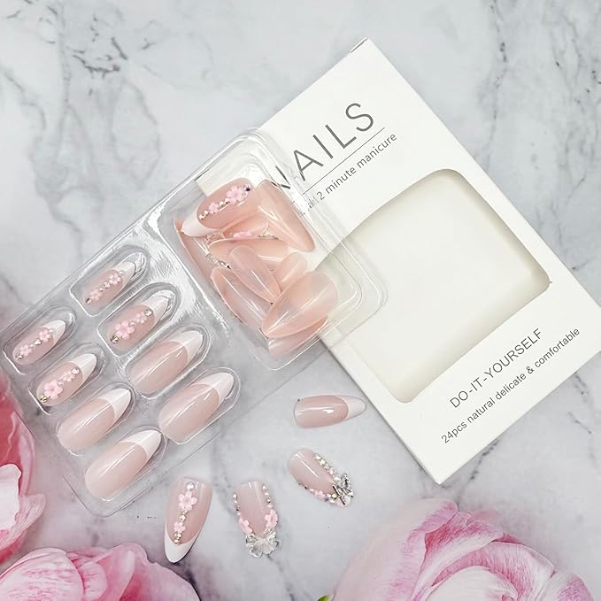 24Pcs Medium Almond Press on Nails Pink French Tip Fake Nails with 3D Flower Pearl Rhinestones Design Glossy Nude Glue on Nails Gold Butterfly Charm Artificial Nails Cute Bow Stick on Nails for Women