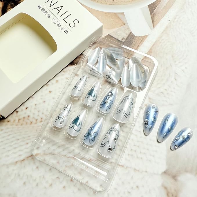 24Pcs Blue Press on Nails Medium Almond Fake Nails with 3D Silver Heart Bow Designs Pearl Rhinestones False Nails Blue White Glossy Acrylic Nail Tips Kit Full Cover Artificial Glue on Nails for Women