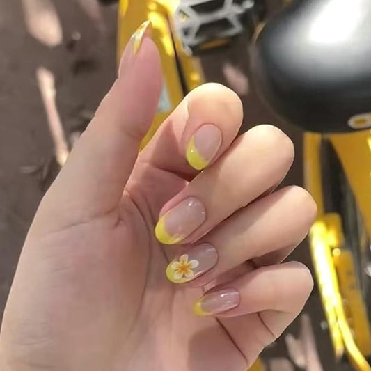 24Pcs Yellow Flower Press on Nails Oval Summer Fake Nails French Tips Glue on Nails Cute Summer Frangipani Designs Glossy Nude False Nails Floral Stick on Nails for Women DIY Manicure