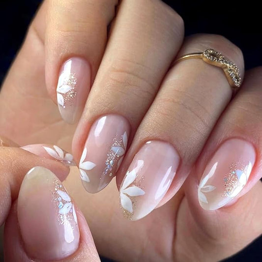 Fall Short Press On Nails Almond, Nude Fake Nails accented with golden glitter and Graceful White Floral Petal Design, Glossy Gel Finish Acrylic Nails, Natural Reusable Glue On Nails Kit for Women