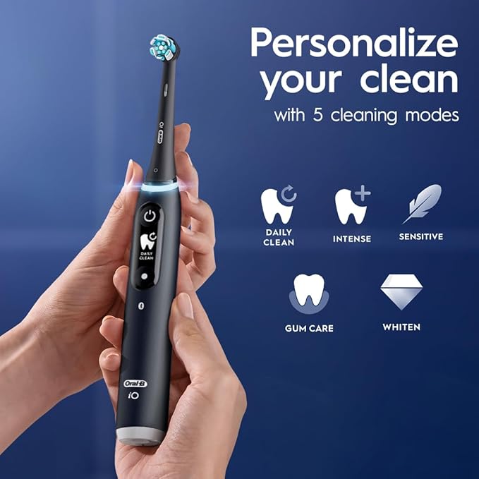 Oral-B iO Series 6 Rechargeable Electric Toothbrush with Visible Pressure Sensor to Protect Gums, 2 Minute Timer, 5 Cleaning Settings, 1 Replacement Toothbrush Head, and Travel Case, Black