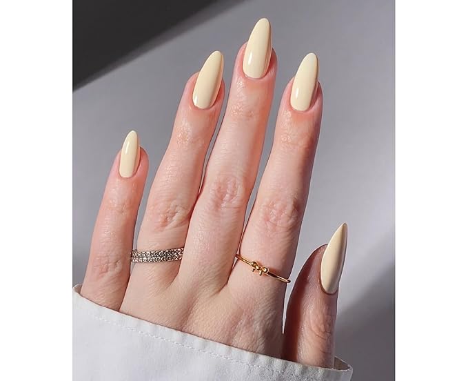 WOOYAS Press on Nails Medium - Creme Light Yellow Almond Fake Nails Solid Color Glossy False Fingernails in 15 Sizes, Long Stick on Nails for Women - 24Pcs