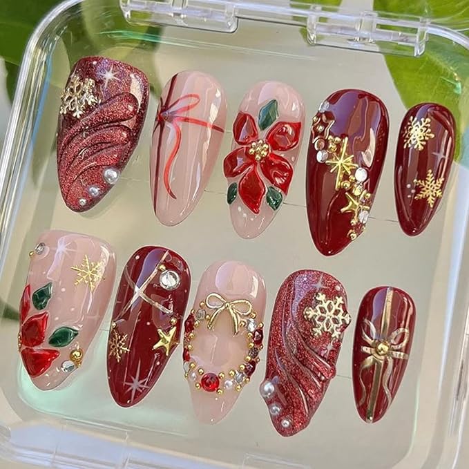 24Pcs Christmas Press on Nails Almond Handmade Fake Nails Snowflake Red Xmas Flower False Nails with 3D Gilding Bow Poinsettia Pearl Wreath Charms Medium Glue on Nails for Women New Year Manicure