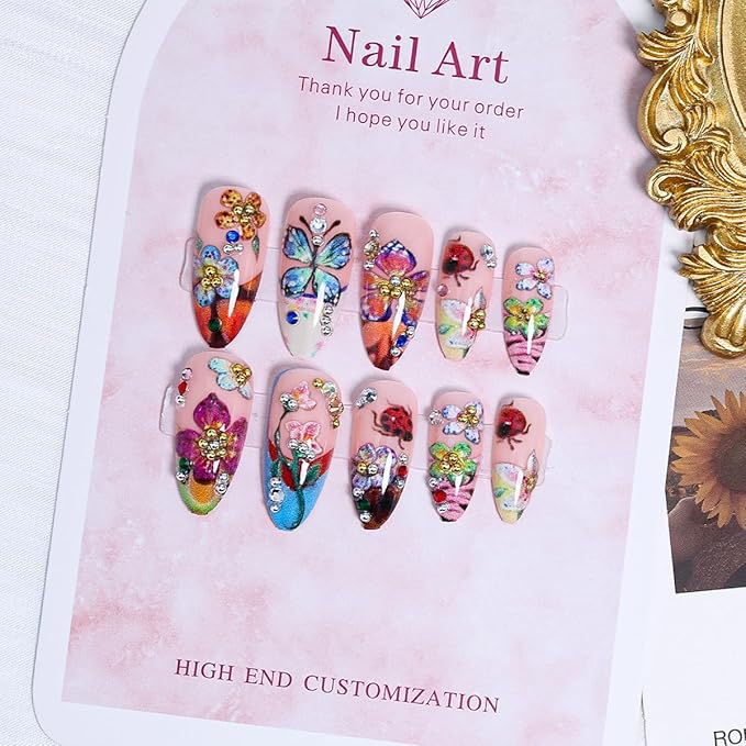 Flower Press on Nails Medium French Tip Fake Nails with 3D Colorful Butterfly Ladybug Floral Design Summer False Nails Gold Rhinestones Artificial Acrylic Nails Almond Glue on Nails for Women 24Pcs