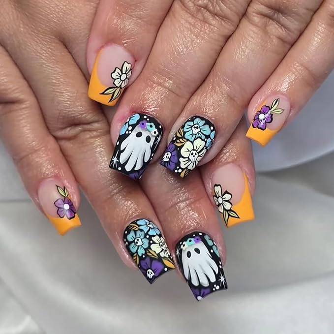 24Pcs Halloween Orange French Tip Press on Nails Short Square False Nail with Colorful Skull Flower Designs Halloween Fake Nails Cute Ghost Stick on Nail for Women DIY Manicure Decorations