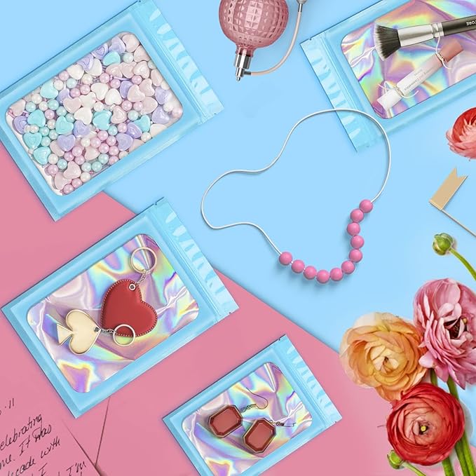 ANZNKU 100 Pack Mylar Bags Reasealable Holographic Bags, Smell Proof Bag Zipper Pouches with Clear Window, Jewelry Candy Sealable Bag for Packaging Sample Party Favor(Blue, 7.1 x 10.2 Inch)