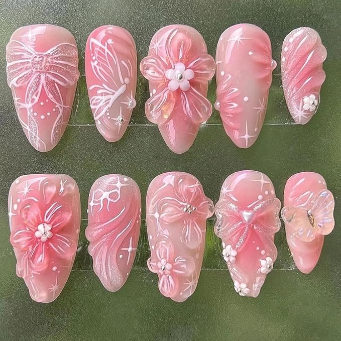 24Pcs Gradient Pink Press on Nails Medium Cute Fake Nails 3D Flower Acrylic Nails Butterfly Bow Artificial Glue on Nails Glossy Pink False Nails Water Ripple Design Almond Stick on Nails for Women