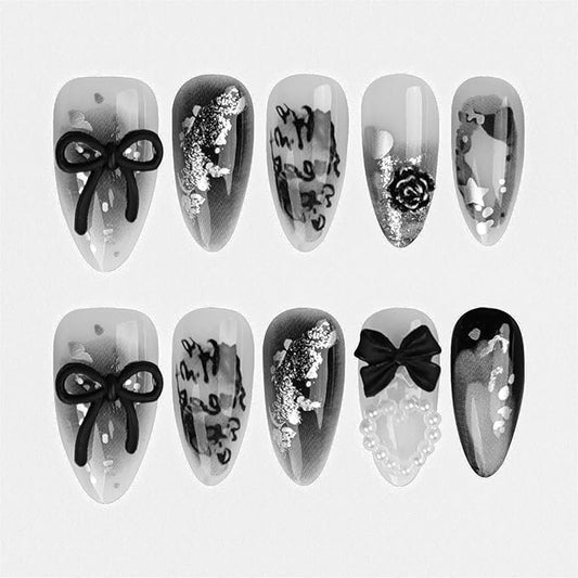 24Pcs Y2K Press on Nails Medium Almond Fake Nails with 3D Hallow Pearl Heart Bow Design Black Smudge Gothic Star Heart False Nails Alloy Retro Rose Nails Charms Stick on Nails for Women Decor