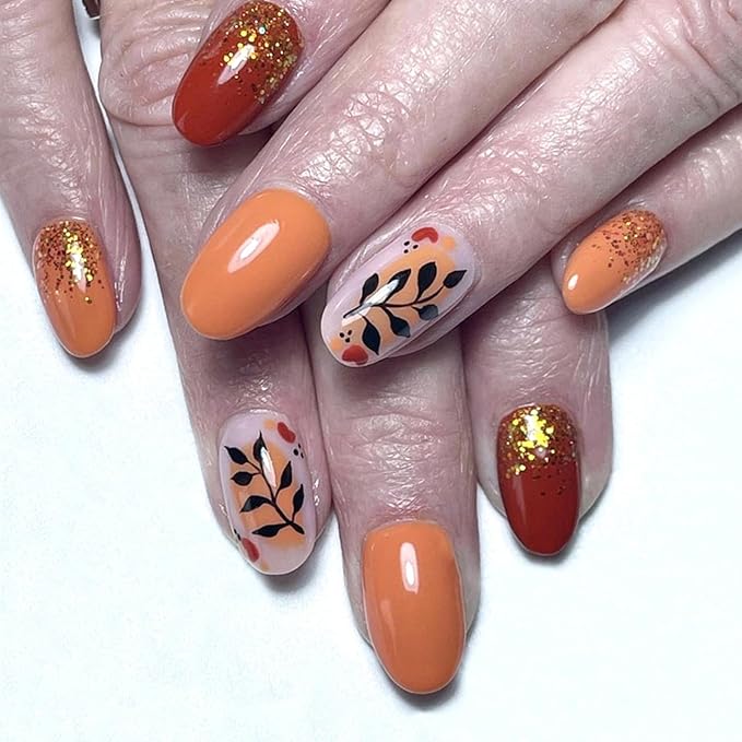 Fall Press on Nails Short Oval Fake Nails Gold Glitter False Nail with Black Leaf Designs Orange Red Glossy Glue on Nails Cute Acrylic Nail Press ons Reusable Manicure Kit for Women 24Pcs