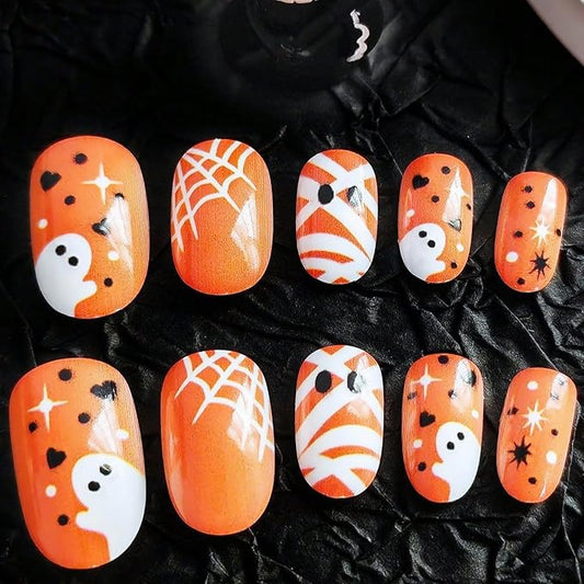 24Pcs Halloween Press on Nails Short Fake Nails Glossy Orange False Nails with Cute Ghost Spider Web Mummy Design Full Cover Artificial Glue on Nails Star Heart Stick on Nail for Women Acrylic Nail