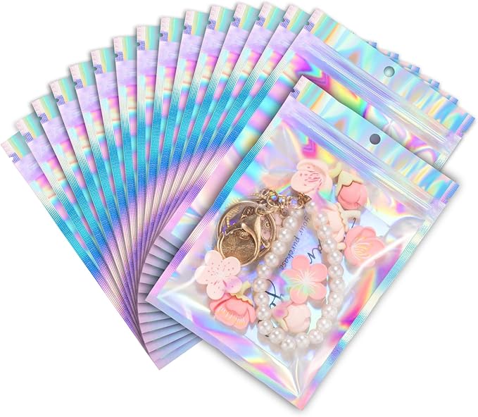 ANZNKU 100 Pack Mylar Bags Reasealable Holographic Bags, Smell Proof Bag Zipper Pouches with Clear Window, Jewelry Candy Sealable Bag for Packaging Sample Party Favor (3 x 4.7 Inch)