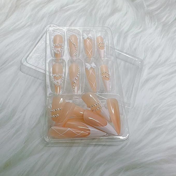 Long Press on Nails 24pcs French Tip Fake Nails 3D Pearl Heart Bow Design Nude Pink Press On White Pearl Summer Nails French Fingertips Almond Full Cover False Nails Cute Stick on Nail Accessories
