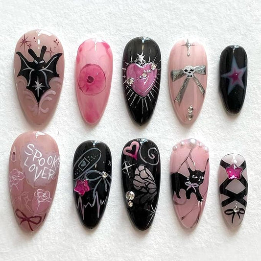 24Pcs Halloween Press on Nails Medium Almond Fake Nails with Gothic Bat Heart Bow Rhinestones Design Glossy Y2k Glitter False Nails Cute Halloween Stick on Nails Cat Nail for Women DIY