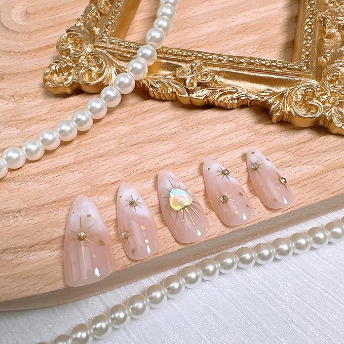 24Pcs Almond Press on Nails Medium Length Gold Star Fake Nails with Heart Diamond Designs Full Cover Nude Gradient Acrylic Nail Sun Stars False Nail Rhinestones Stick on Nails for Women