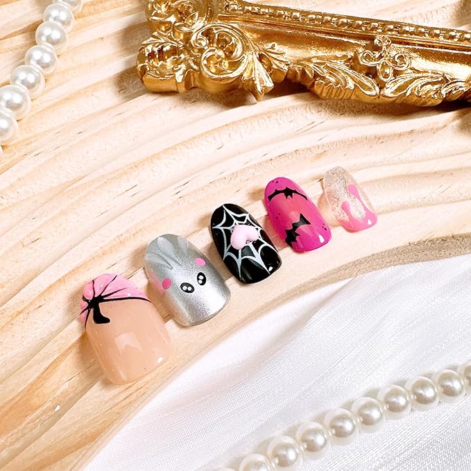 24pcs Halloween Press on Nails Short Almond Fake Nails with 3D Pumpkin Pink Heart Designs Cute Ghost False Nails Bat Spider Web Acrylic Nails Kit Full Cover Glue on Nail for Women Nail Decoration