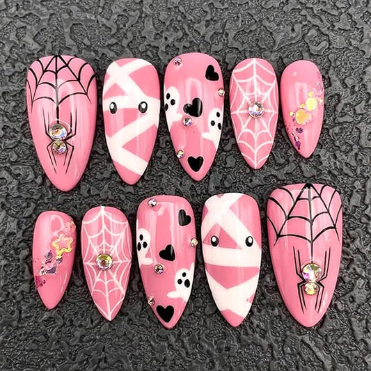 24Pcs Halloween Press on Nails Medium Almond Fake Nails with Cute Ghost Spider Web Mummy Design Pink Stick on Nails Silver Glitter Rhinestones False Nails Full Cover Artificial Glue on Nail for Women