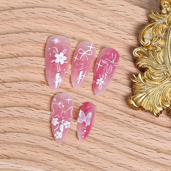 24Pcs Gradient Pink Press on Nails Medium Cute Fake Nails 3D Flower Acrylic Nails Butterfly Bow Artificial Glue on Nails Glossy Pink False Nails Water Ripple Design Almond Stick on Nails for Women